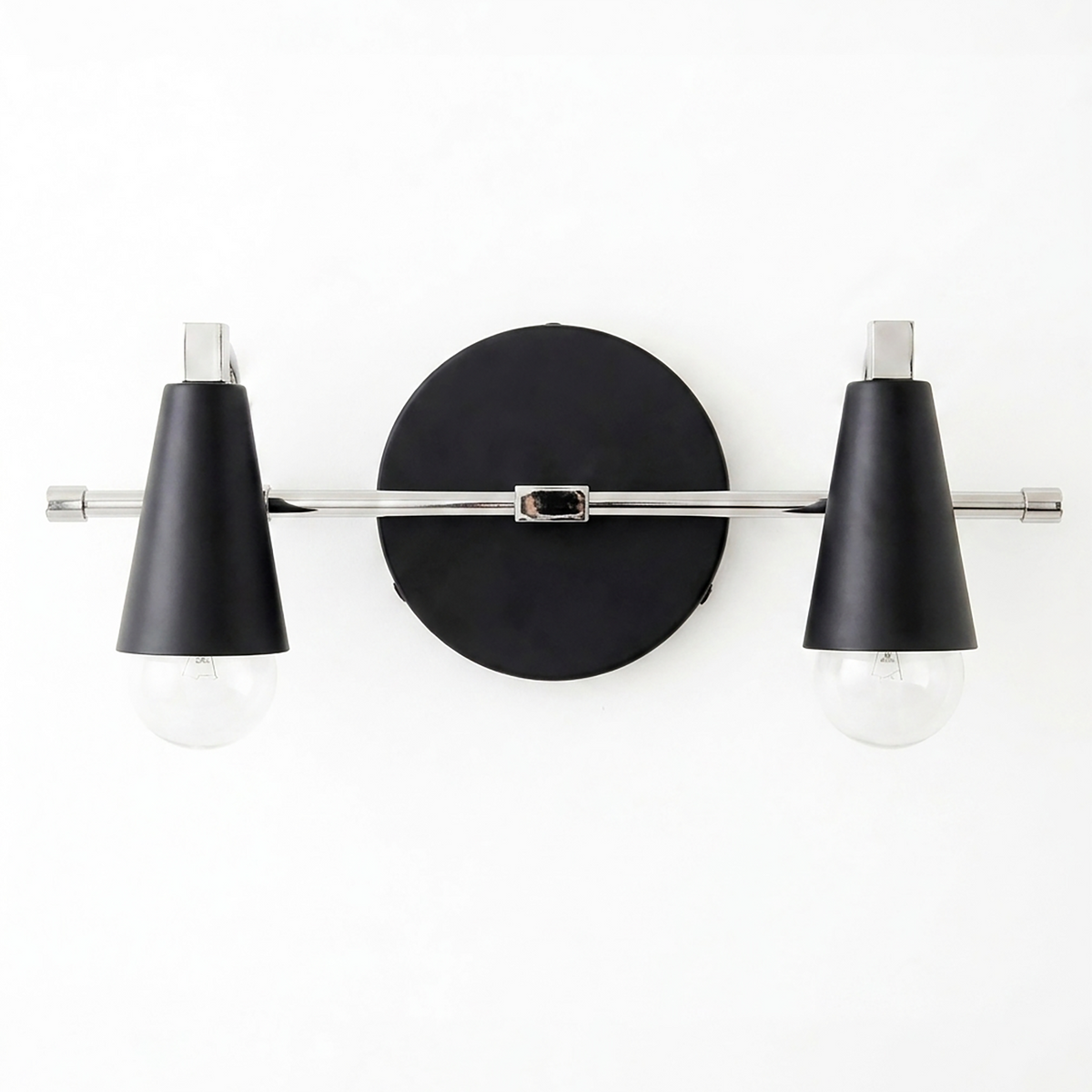 Two-bulb vanity light with black conical shades and chrome horizontal rod mounted on round black base. - VANITY LIGHT MODEL NO. 1229