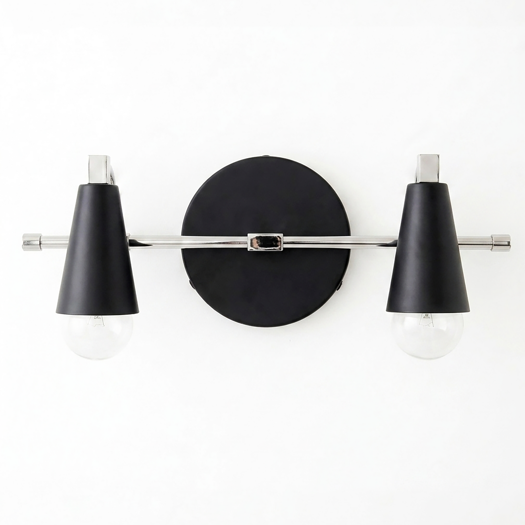 Two-bulb vanity light with black conical shades and chrome horizontal rod mounted on round black base. - VANITY LIGHT MODEL NO. 1229