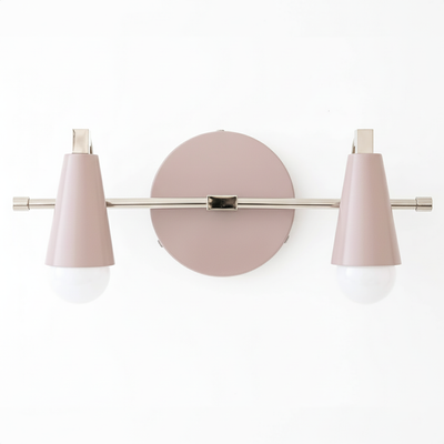 Modern vanity light with two conical pink metal shades and brushed nickel horizontal bar and round backplate. - VANITY LIGHT MODEL NO. 1229