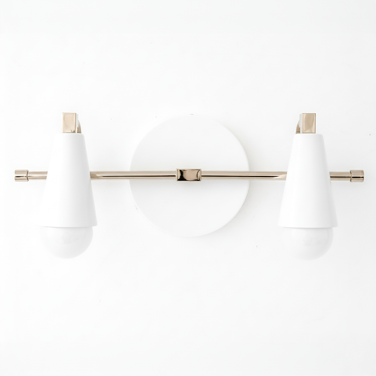 Two-bulb vanity light with white conical shades and brushed nickel horizontal bar mounted on round white base. - VANITY LIGHT MODEL NO. 1229