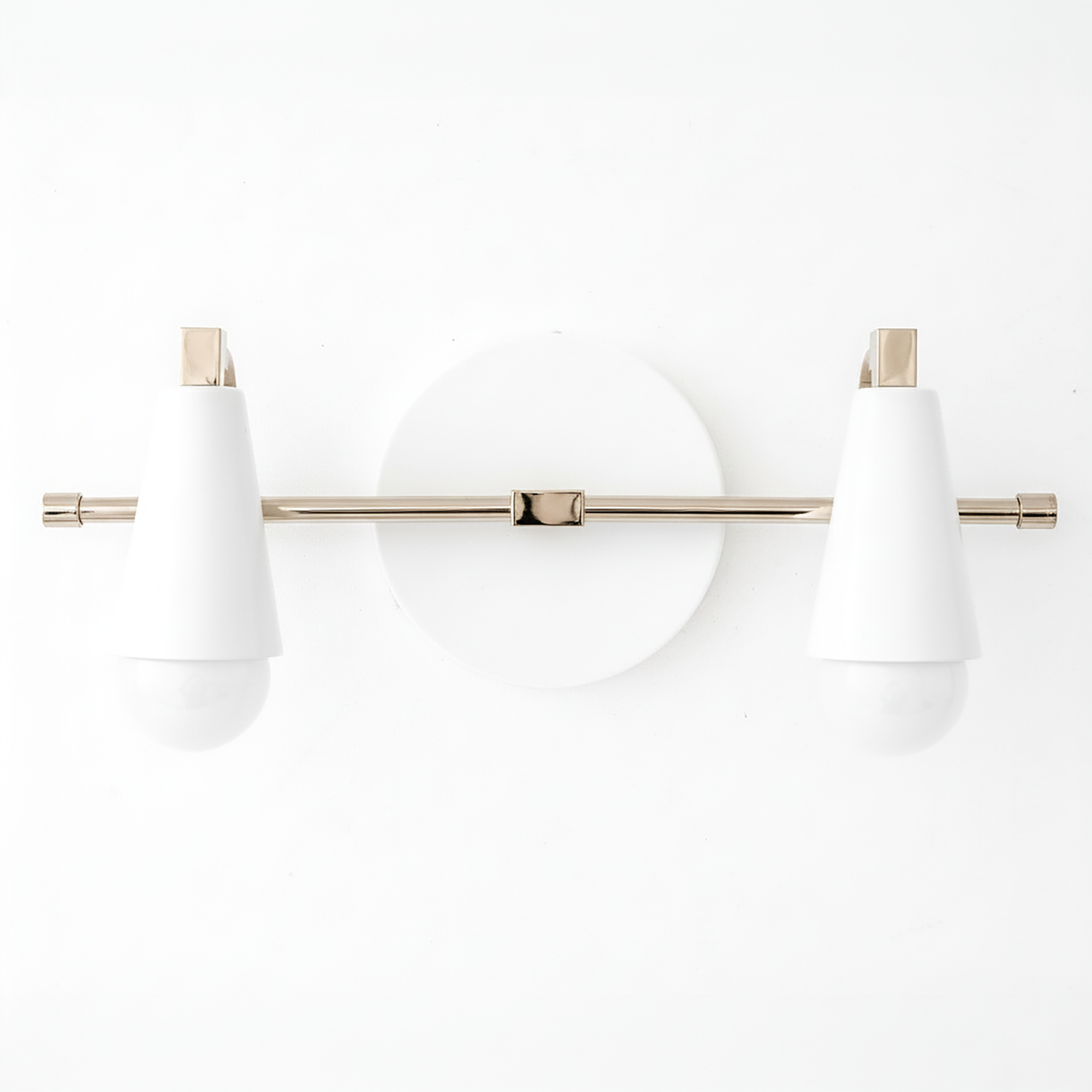 Two-bulb vanity light with white conical shades and brushed nickel horizontal bar mounted on round white base. - VANITY LIGHT MODEL NO. 1229