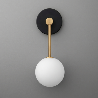 Wall sconce with matte black round base, brass rod, and frosted white glass globe shade. - Sconce Model No. 5999