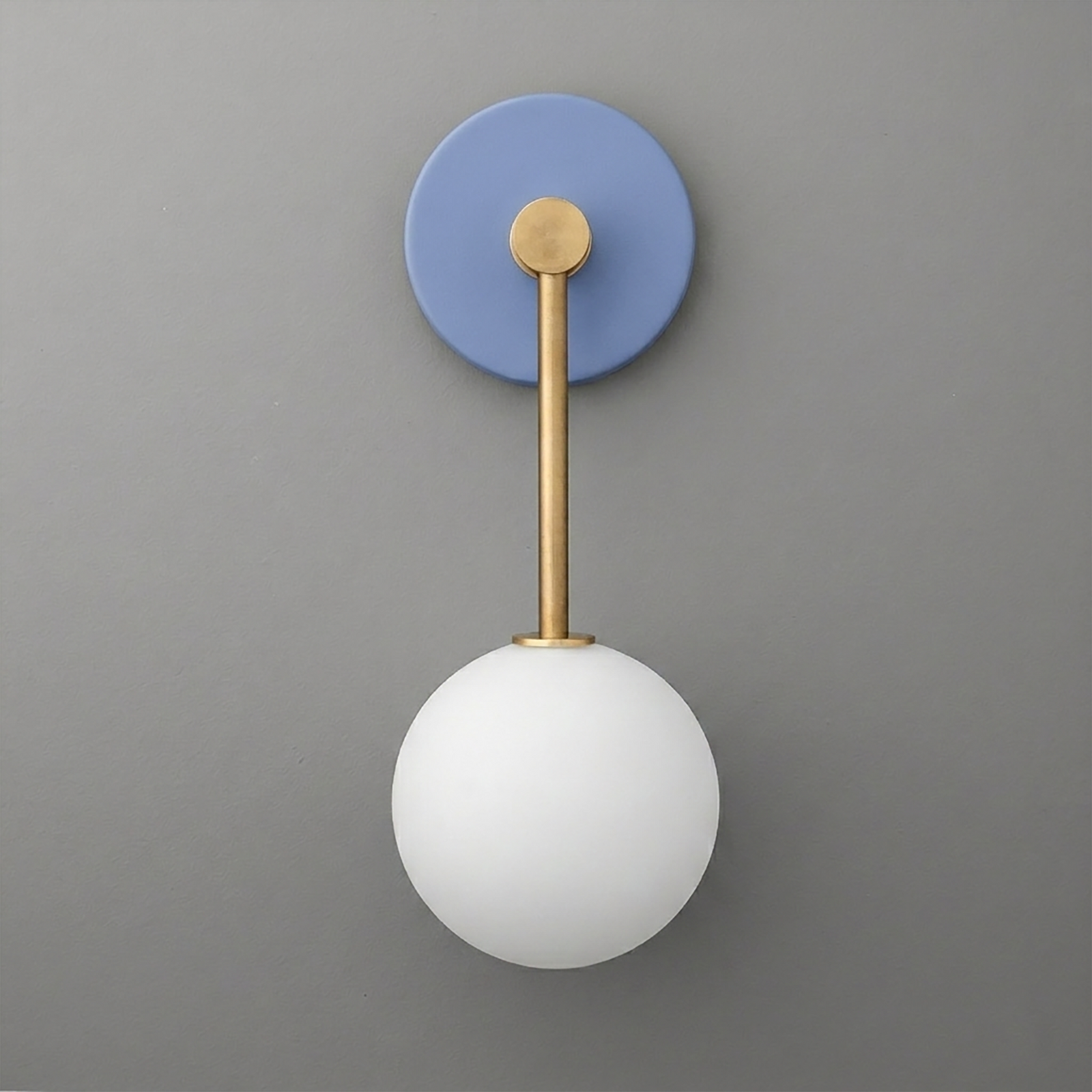 Wall sconce with matte blue round base, brass rod, and frosted white globe shade. - Sconce Model No. 5999