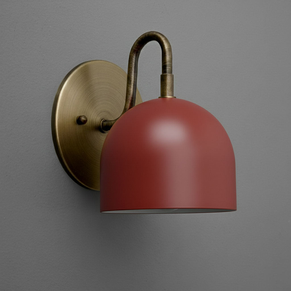 Matte red dome-shaped metal sconce with antique brass curved arm and round wall plate. - Sconce Model No. 5416