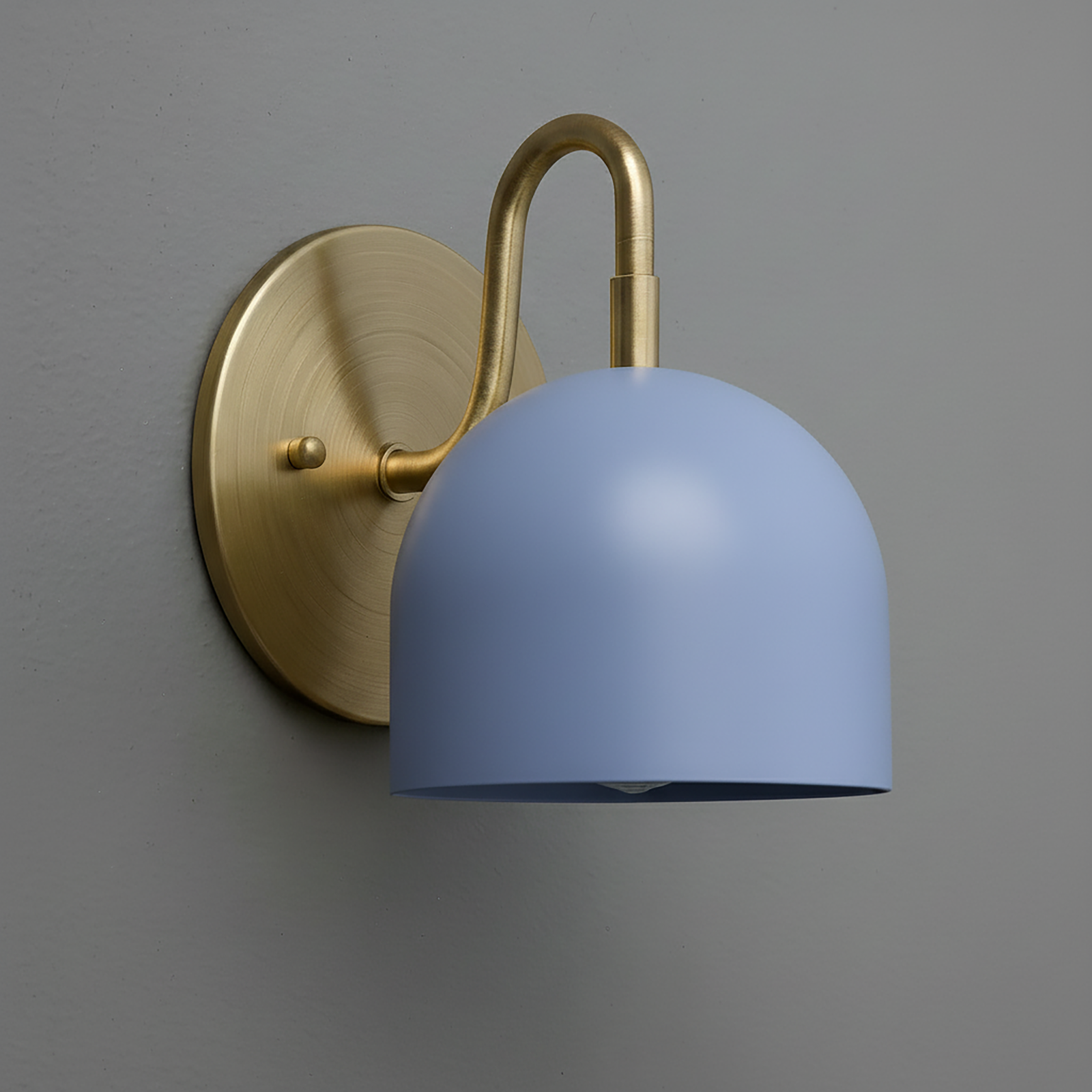 Brushed brass wall sconce with curved arm and matte blue dome-shaped shade. - Sconce Model No. 5416