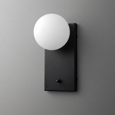 Black rectangular metal sconce with a matte finish holding a frosted white globe bulb on top. - Sconce Model No. 2196