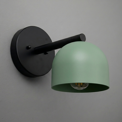 Matte black metal wall sconce with a round base and a dome-shaped sage green shade from the Deep Ball Collection. - Sconce Model No. 5356