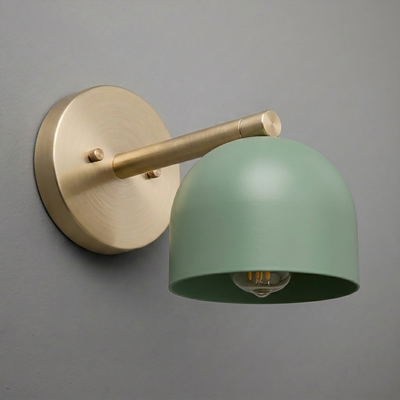 Matte green dome-shaped sconce with brushed brass arm and round wall mount, single bulb fixture. - Sconce Model No. 5356