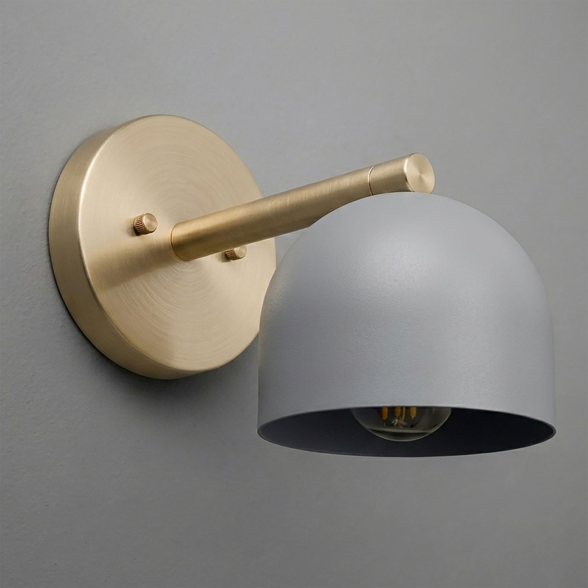 Matte gray dome-shaped metal sconce with brushed brass arm and round wall mount. - Sconce Model No. 5356
