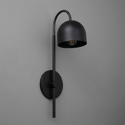 Matte black metal wall sconce with curved arm and dome-shaped shade, single bulb design. - Sconce Model No. 7340