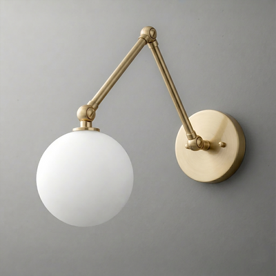 Wall-mounted sconce with matte brass adjustable arm and frosted white globe shade. - SCONCE MODEL NO. 5202