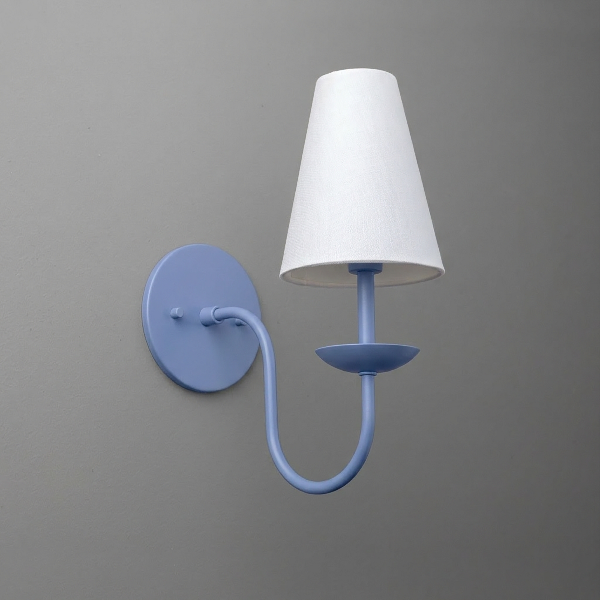 Matte blue metal wall sconce with curved arm and white fabric tapered lampshade. - SCONCE MODEL NO. 7085