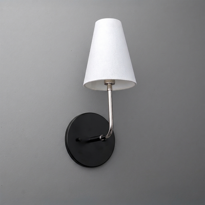 Wall-mounted sconce with black round base, brushed metal arm, and white tapered fabric shade. - SCONCE MODEL NO. 3928