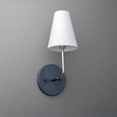 Wall-mounted sconce with a matte black round base, brushed metal arm, and white tapered fabric shade. - SCONCE MODEL NO. 3928