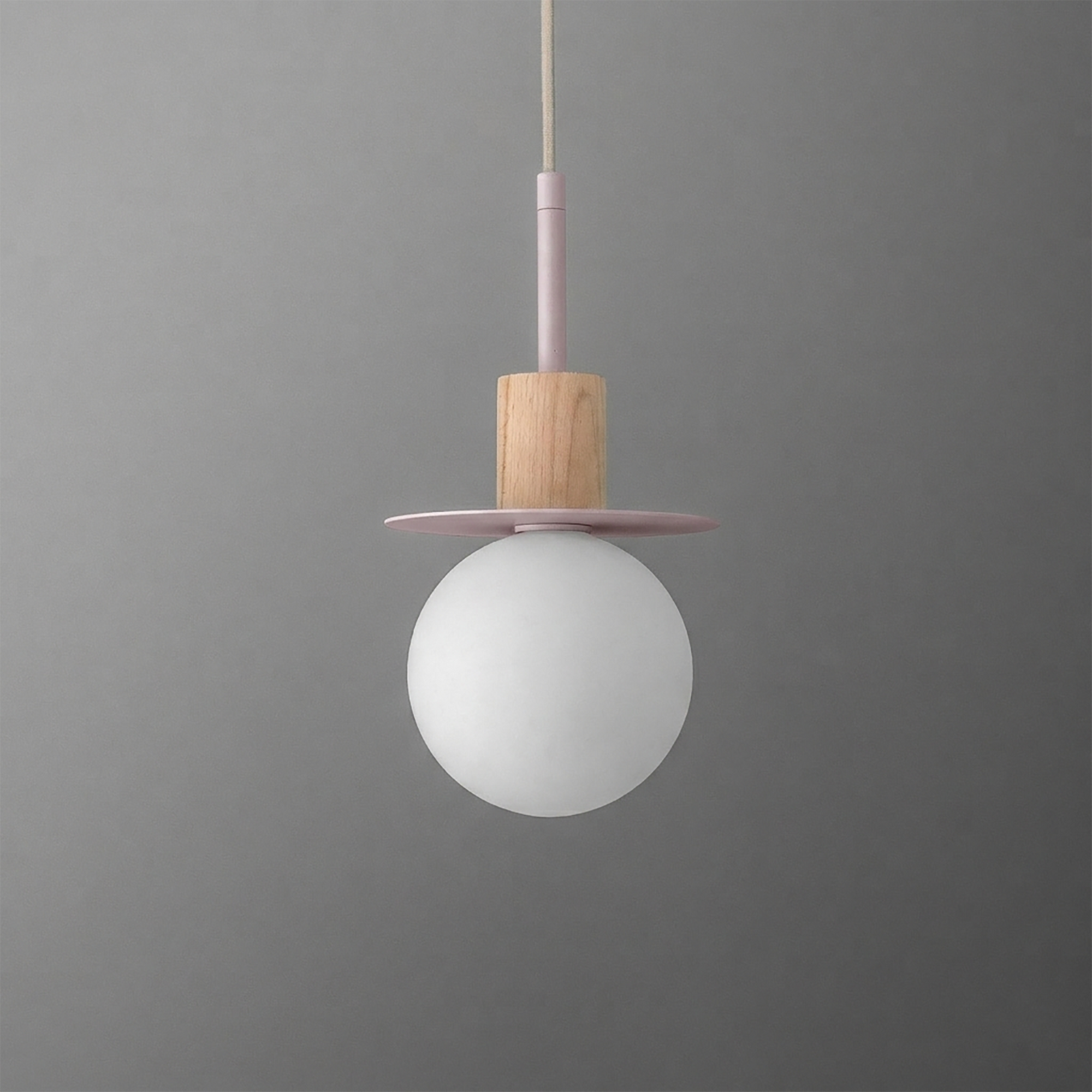 Minimalist pendant light with a frosted white globe, wooden accent, and soft pink disc. - PENDANT MODEL NO. 6198