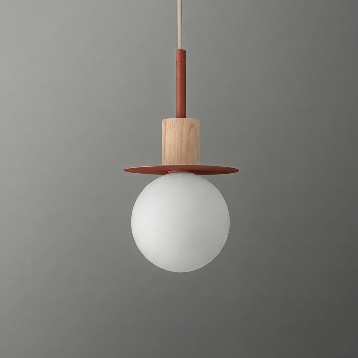 Pendant light with a frosted white globe, wooden cylindrical holder, and flat rust-colored disc above the globe. - PENDANT MODEL NO. 6198
