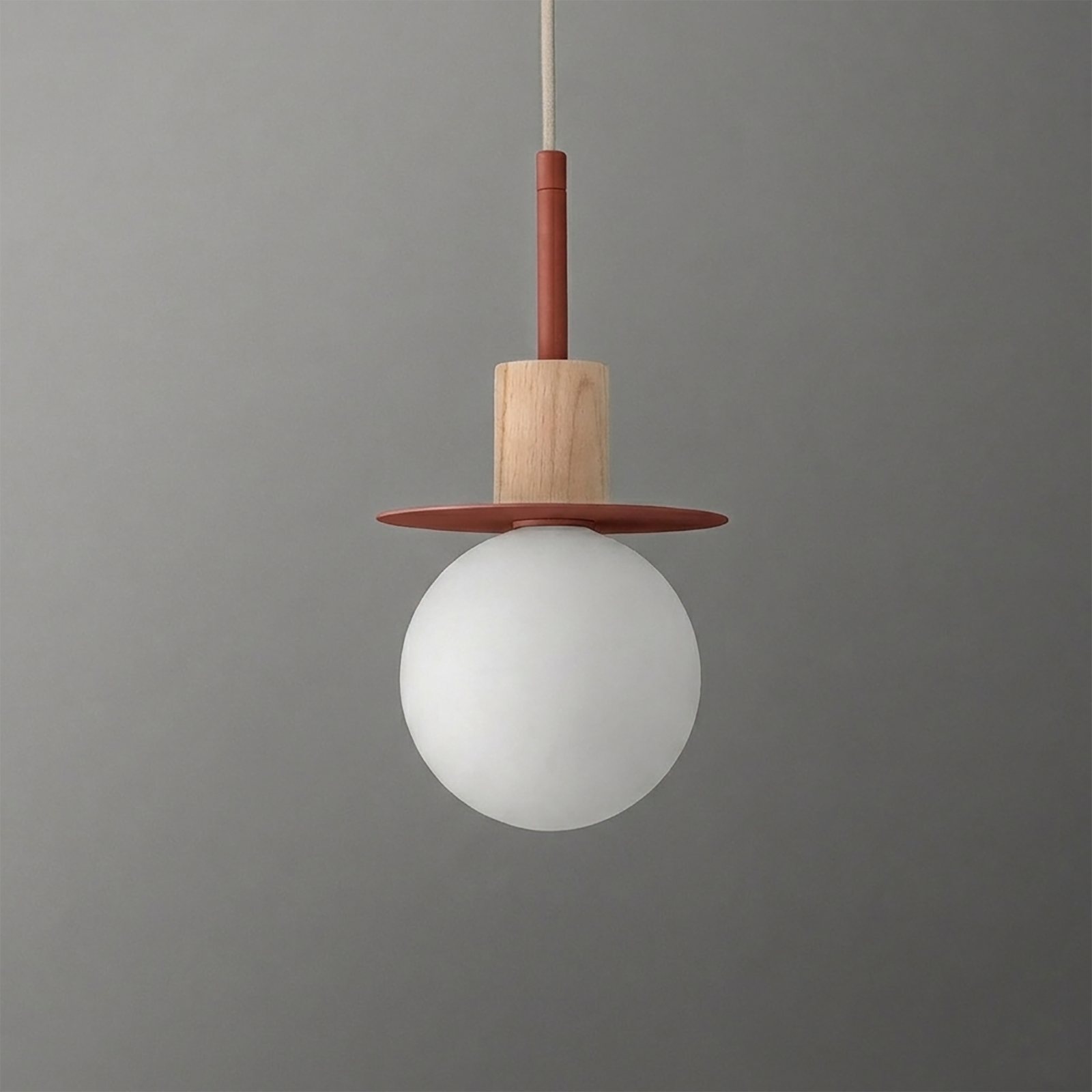 Pendant light with a frosted white globe, wooden cylindrical holder, and flat rust-colored disc above the globe. - PENDANT MODEL NO. 6198