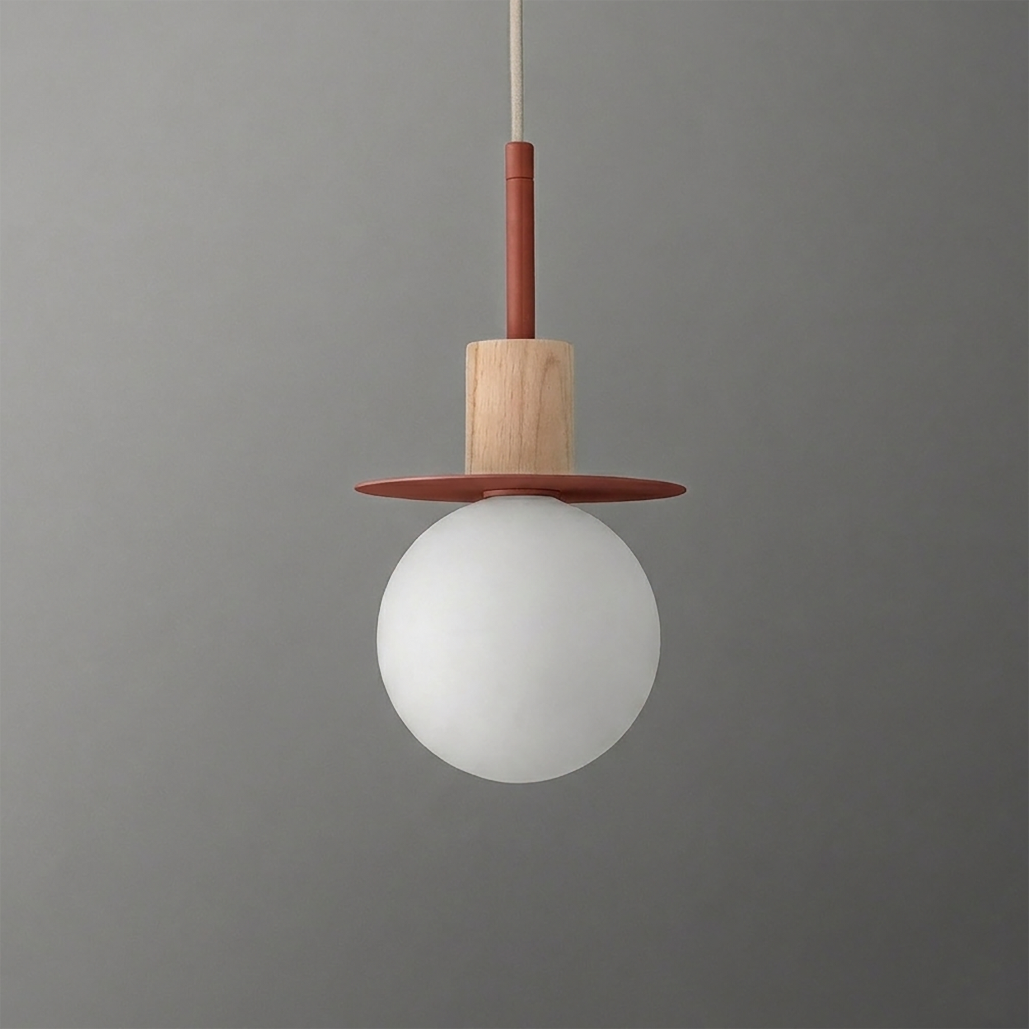 Pendant light with a frosted white globe, wooden cylindrical holder, and flat rust-colored disc above the globe. - PENDANT MODEL NO. 6198