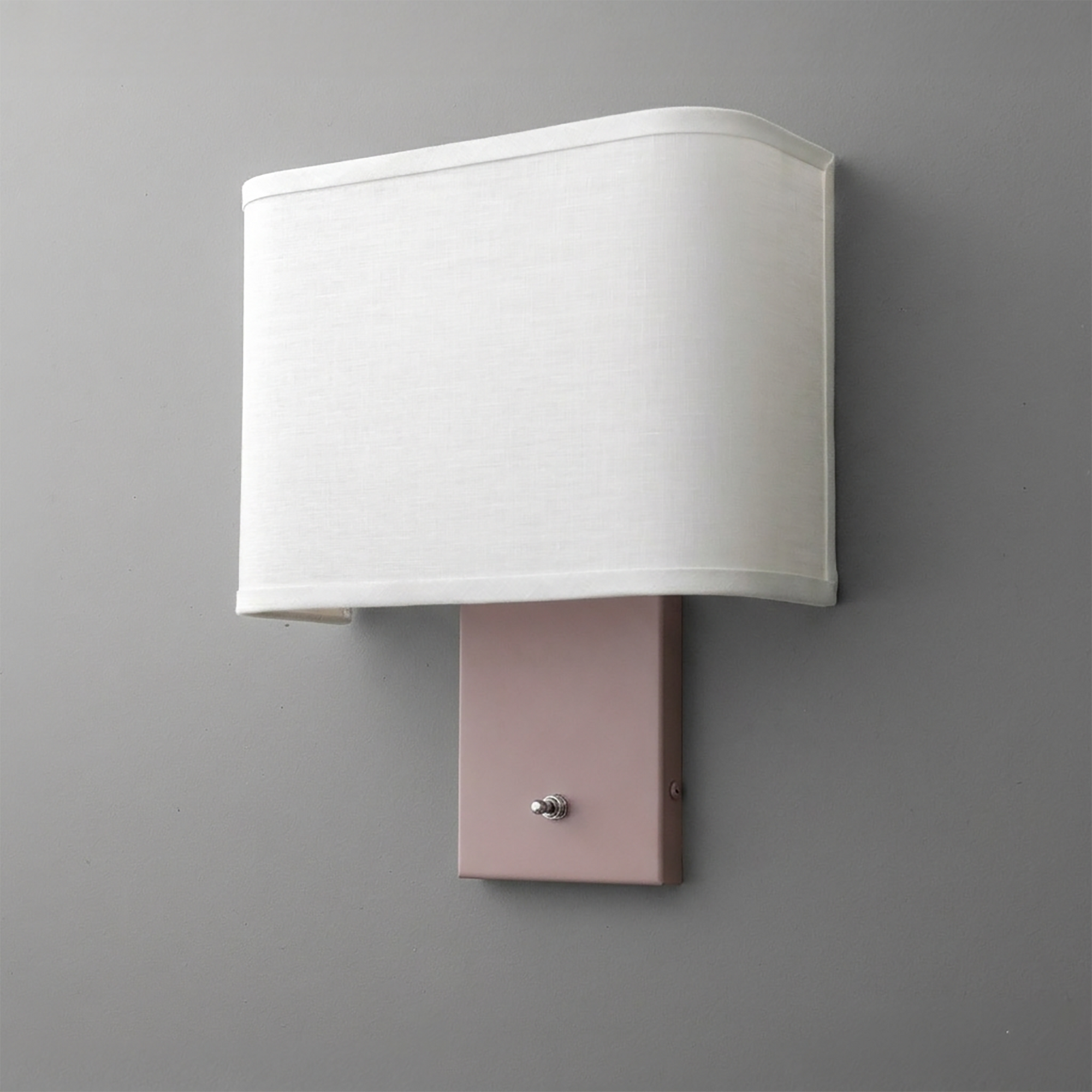 Wall-mounted sconce with rectangular white fabric shade and matte pink rectangular metal base with chrome switch knob. - SCONCE MODEL NO. 7769