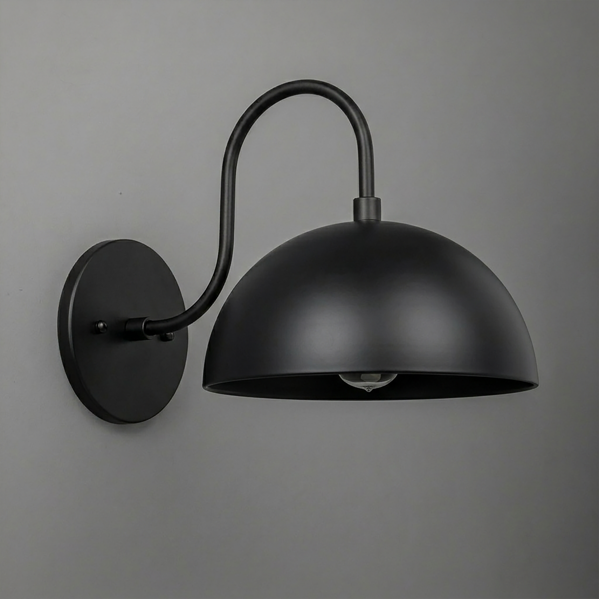 Matte black metal wall sconce with dome-shaped shade and curved arm mounting on circular base. - SCONCE MODEL NO. 9092