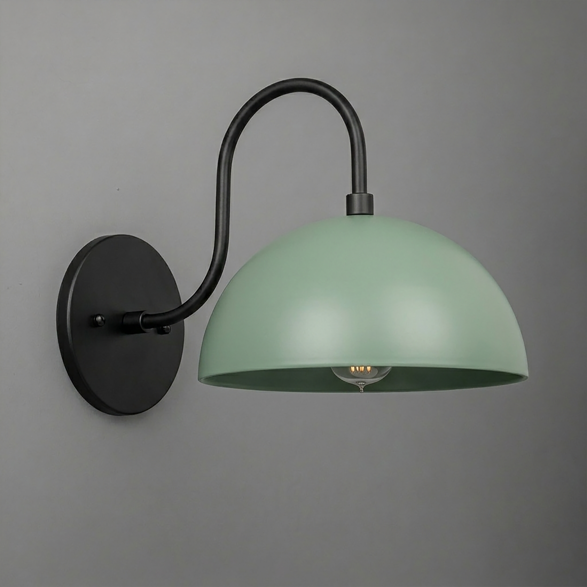 Matte black metal wall sconce with curved arm and large mint green dome shade covering one bulb. - SCONCE MODEL NO. 9092