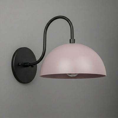 Black metal wall sconce with curved arm and matte pink dome-shaped shade, single bulb design. - SCONCE MODEL NO. 9092