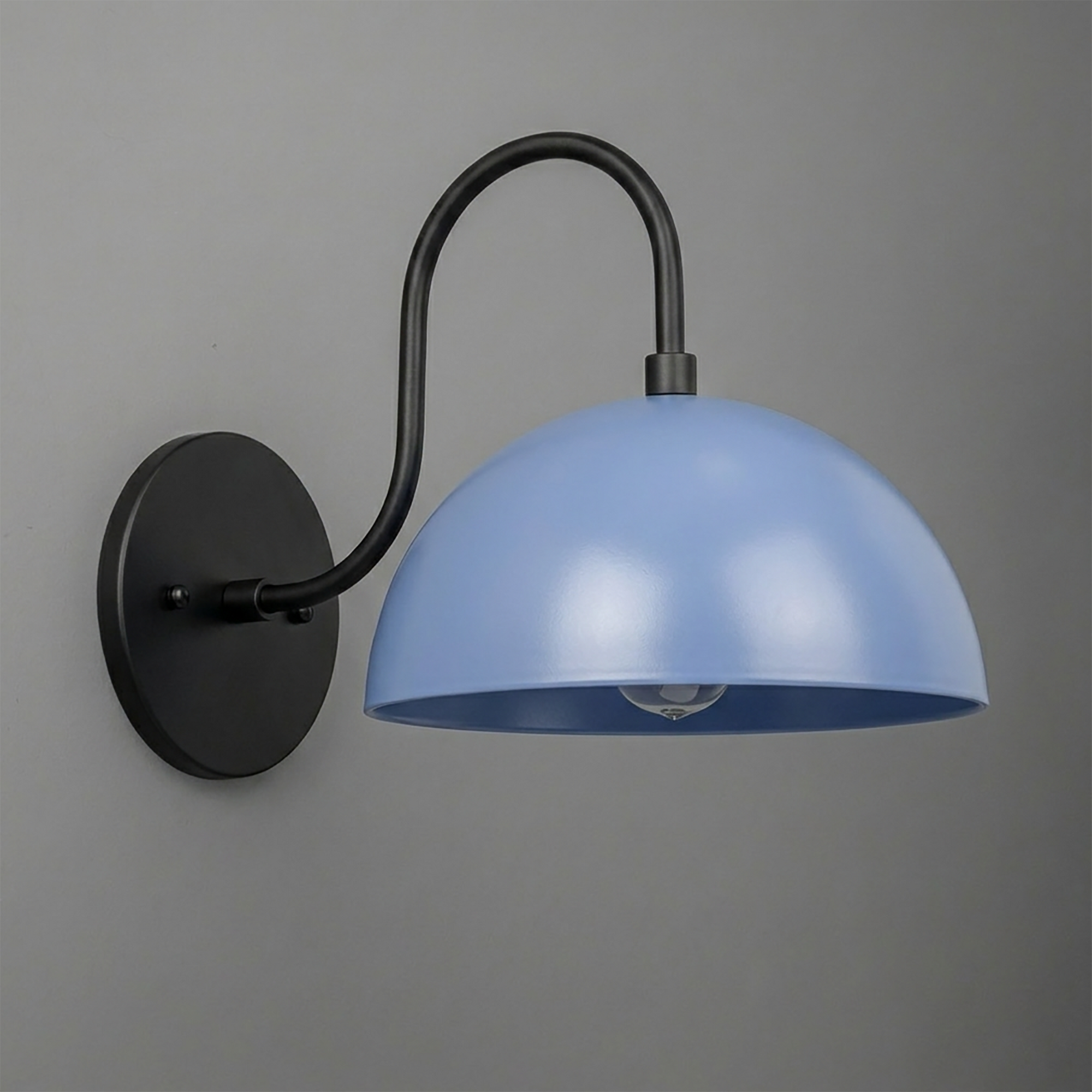 Black metal wall sconce with curved arm and smooth matte blue dome-shaped shade covering one bulb. - SCONCE MODEL NO. 9092