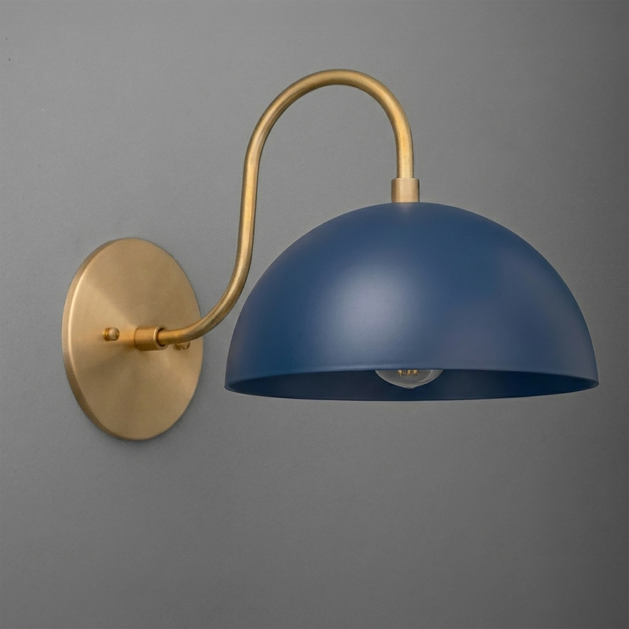 Wall sconce with matte blue dome shade and curved brushed brass arm and base plate. - SCONCE MODEL NO. 9092