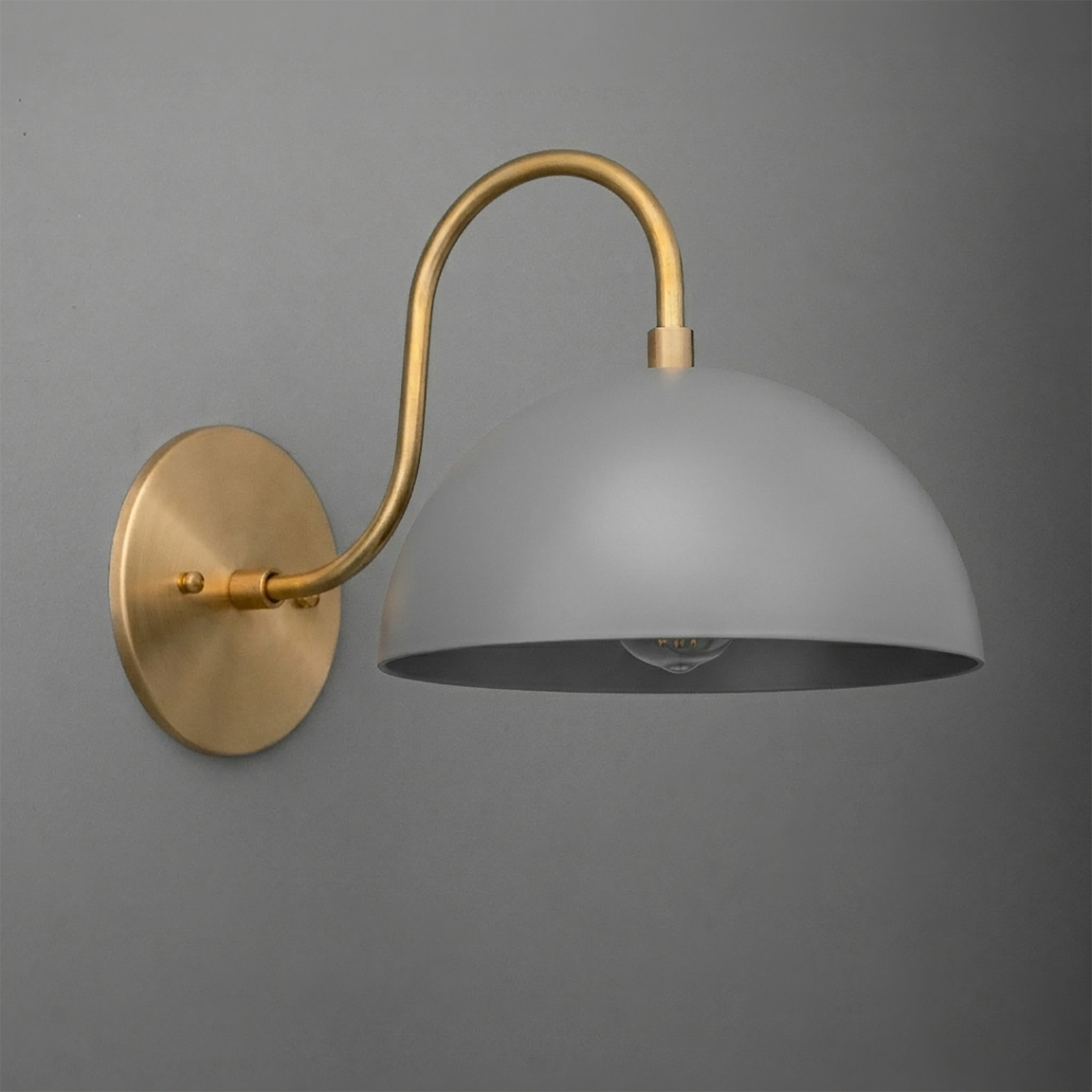 Wall-mounted sconce with brushed brass arm and round gray metal dome shade. - SCONCE MODEL NO. 9092