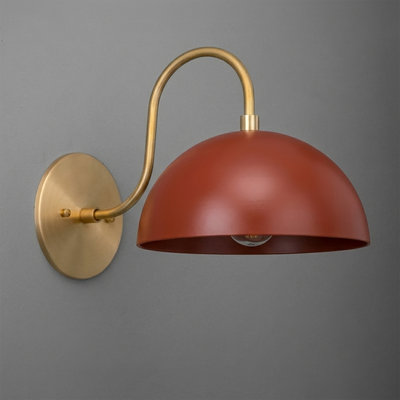 Wall sconce with curved brass arm and matte terracotta dome shade from Dome Series Collection. - SCONCE MODEL NO. 9092