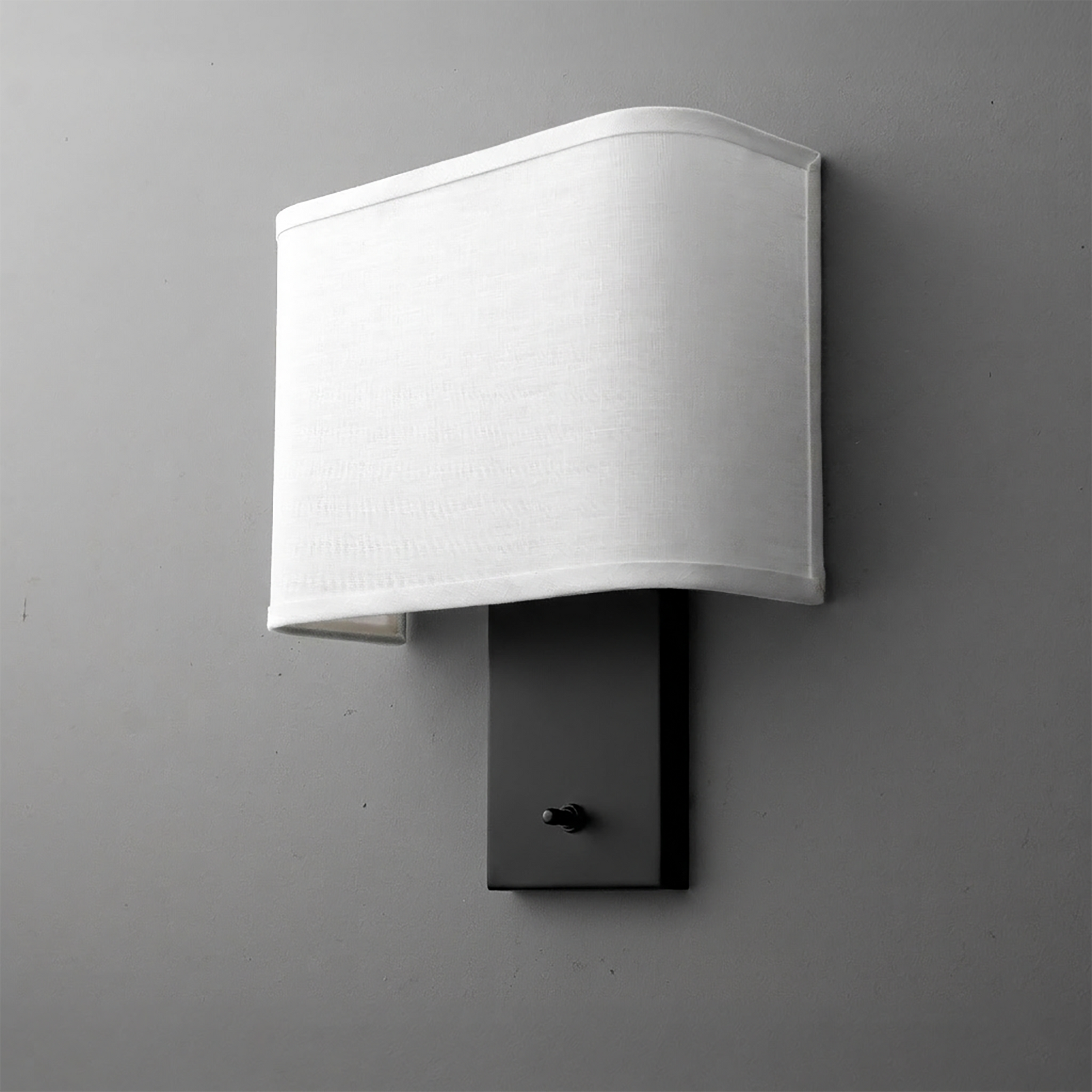 Wall sconce with rectangular white fabric shade and black metal base with a small switch knob. - SCONCE MODEL NO. 1918