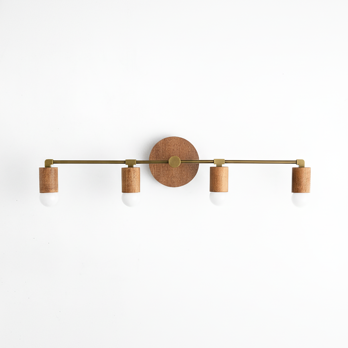 Four-bulb vanity light with natural wood and antique brass finish, clean modern design. - VANITY LIGHT MODEL NO. 2017