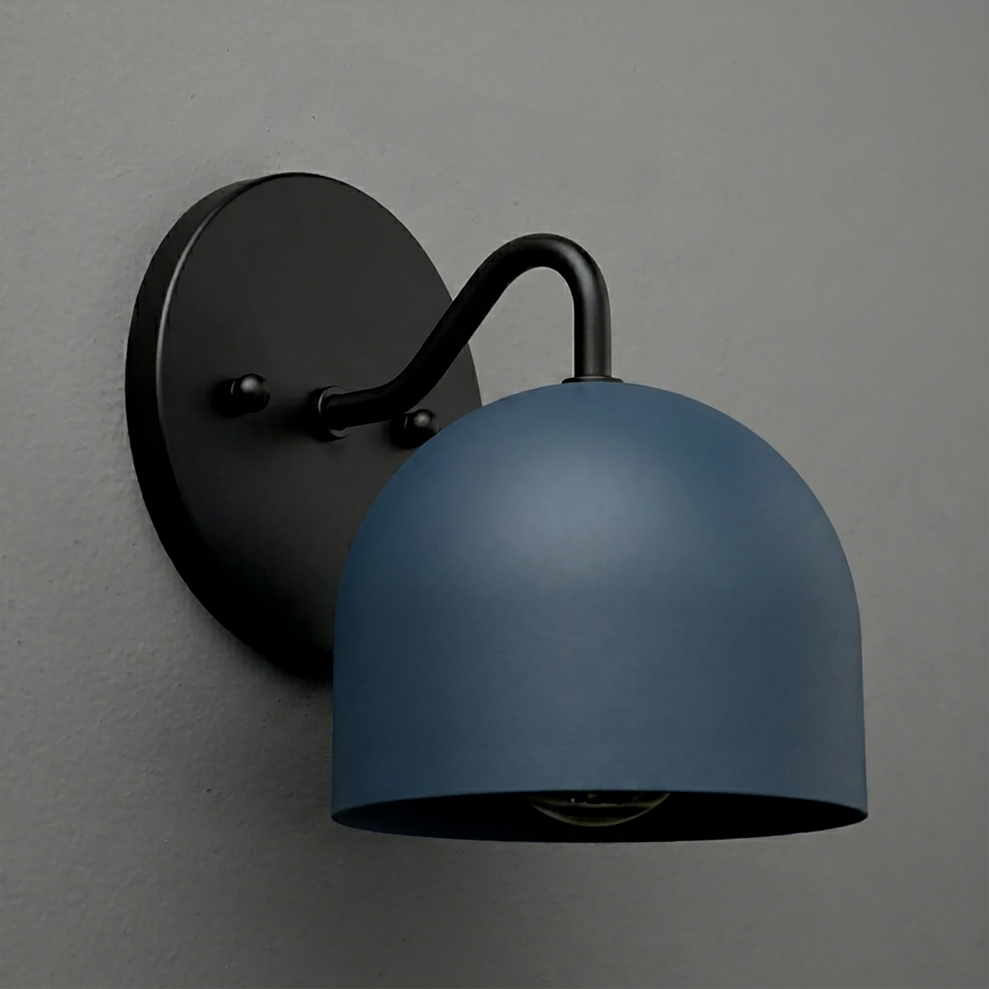 Matte black wall sconce with curved arm and deep matte blue dome-shaped metal shade. - SCONCE MODEL NO. 9436