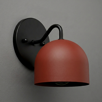 Matte black wall-mounted sconce with a rust-red dome-shaped metal shade and curved arm. - SCONCE MODEL NO. 9436