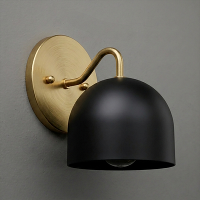 Matte black dome-shaped metal sconce with brass arm and round brass wall plate. - SCONCE MODEL NO. 9436