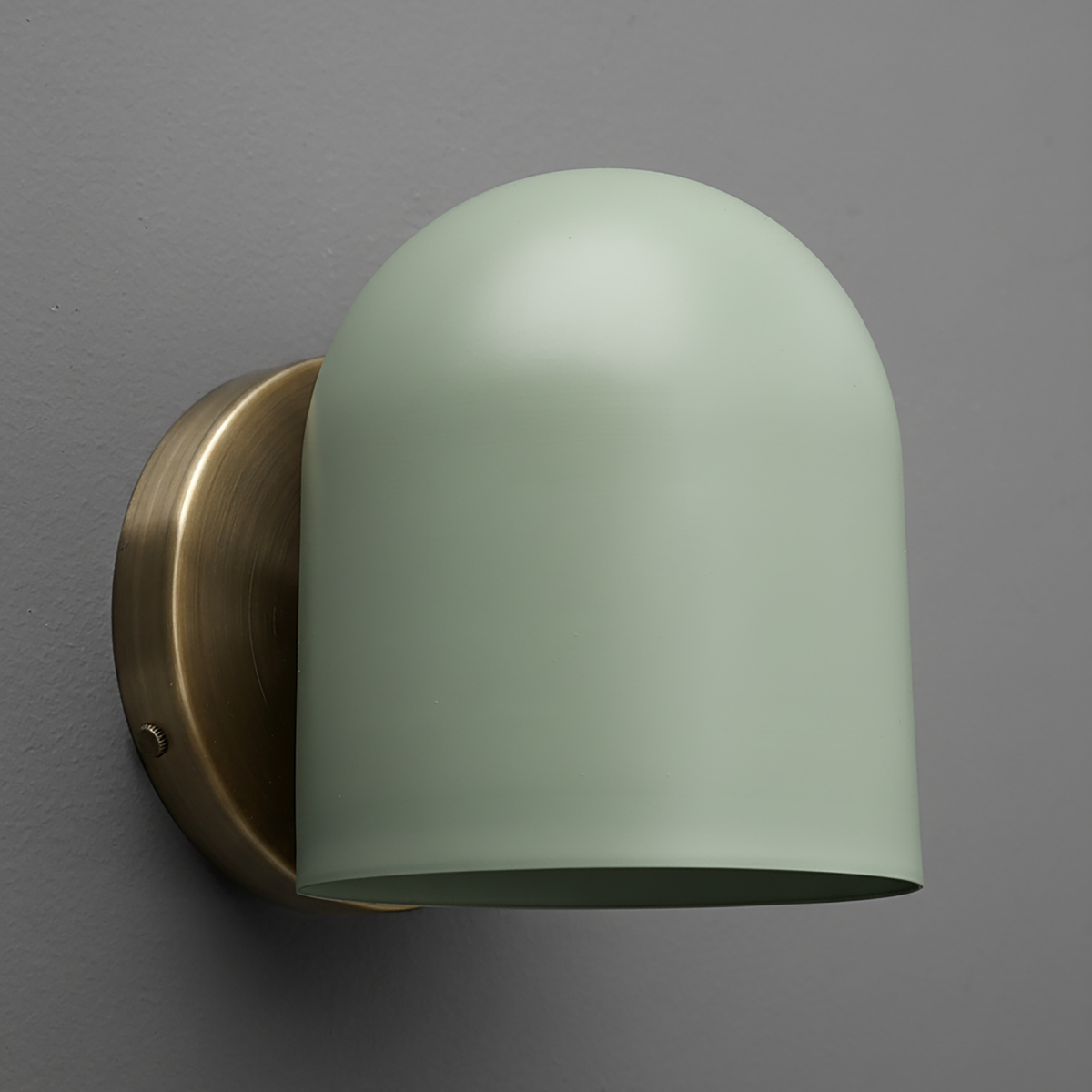 Matte light green dome-shaped metal sconce with antique brass round wall mount. - SCONCE MODEL NO. 2424