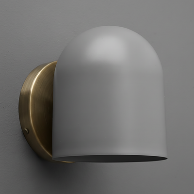 Matte white dome-shaped metal sconce with brushed brass wall mount on gray background. - SCONCE MODEL NO. 2424