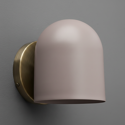Wall sconce with matte light pink dome shade and brushed brass round mounting plate. - SCONCE MODEL NO. 2424