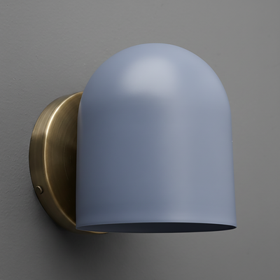 Matte brass wall sconce with smooth, curved light blue glass shade. - SCONCE MODEL NO. 2424