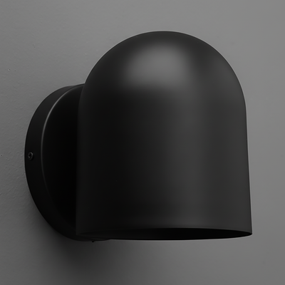 Matte black metal wall sconce with rounded dome-shaped shade and circular mounting plate. - SCONCE MODEL NO. 2424