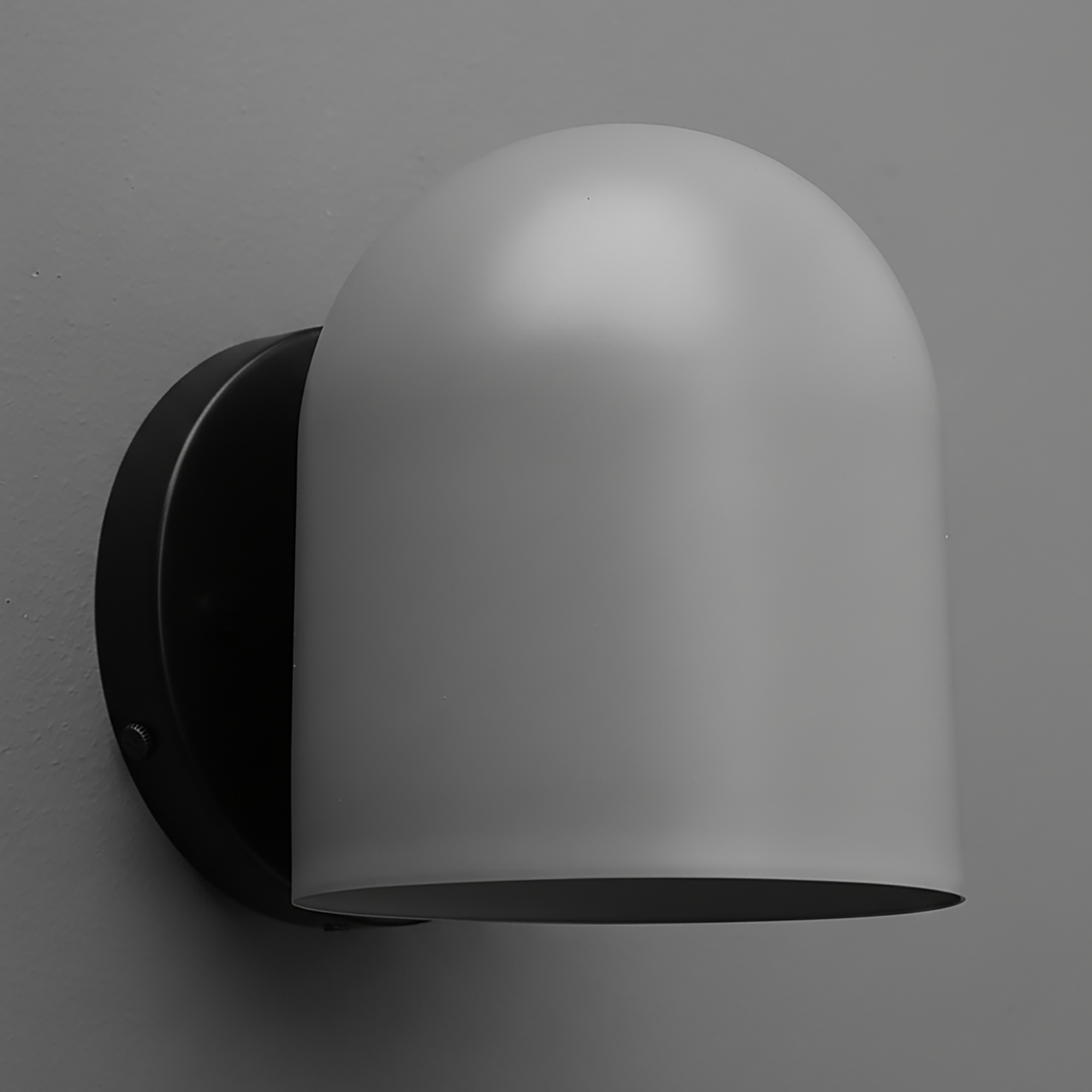 Matte gray dome-shaped metal sconce with a black circular wall mount. - SCONCE MODEL NO. 2424