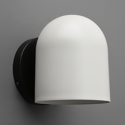Matte white dome-shaped wall sconce with smooth surface and black round mounting plate. - SCONCE MODEL NO. 2424