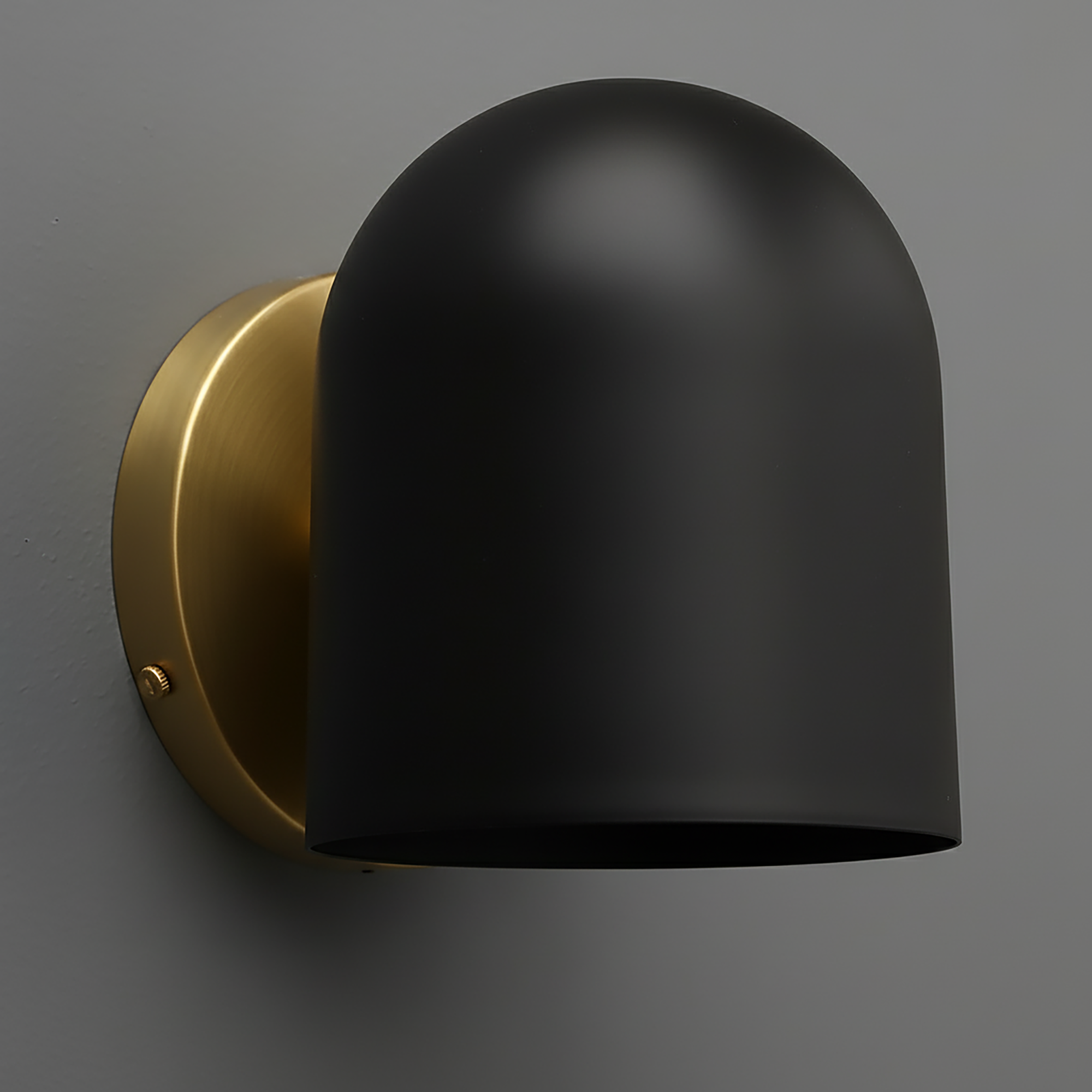 Matte black dome sconce with antique brass wall mount on gray background. - SCONCE MODEL NO. 2424