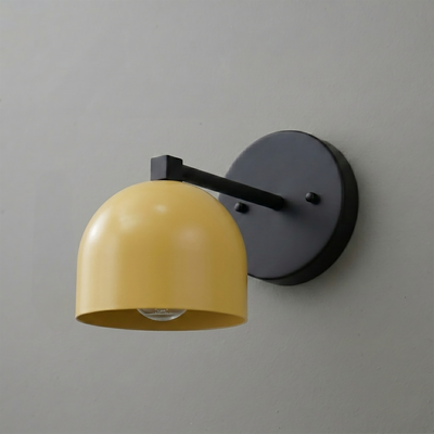 Wall-mounted sconce with matte black round base and arm, featuring a smooth yellow dome-shaped metal shade. - SCONCE MODEL NO. 3622