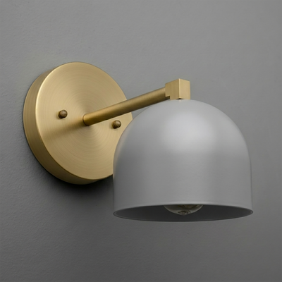Matte gold metal wall sconce with a round backplate and a smooth gray dome shade covering one bulb. - SCONCE MODEL NO. 3622
