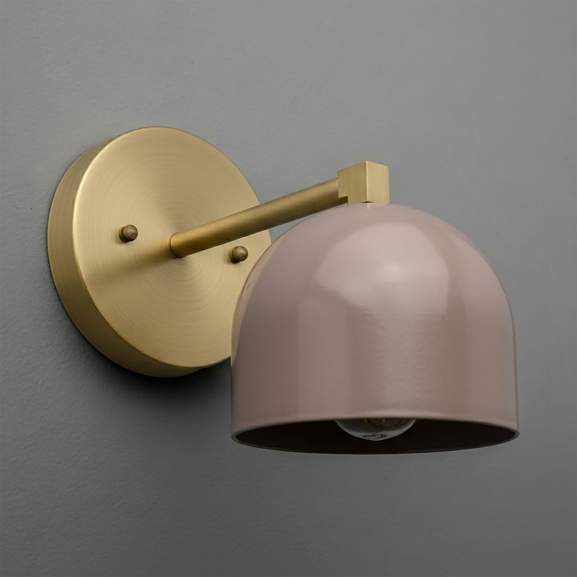 Matte pink dome-shaped metal sconce with brushed brass round base and arm. - SCONCE MODEL NO. 3622