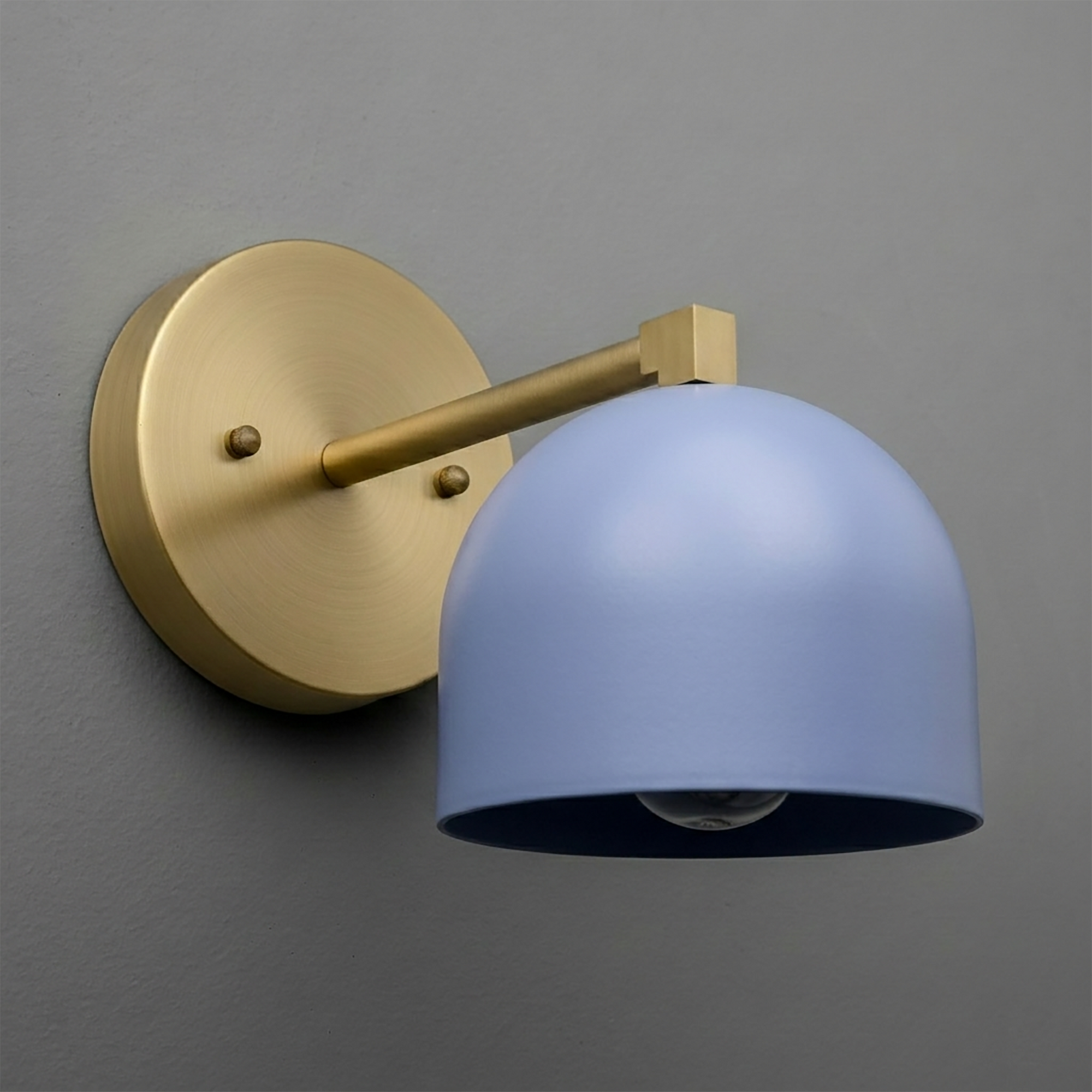 Modern wall sconce with matte gold round base and arm, featuring a smooth sky blue dome shade. - SCONCE MODEL NO. 3622