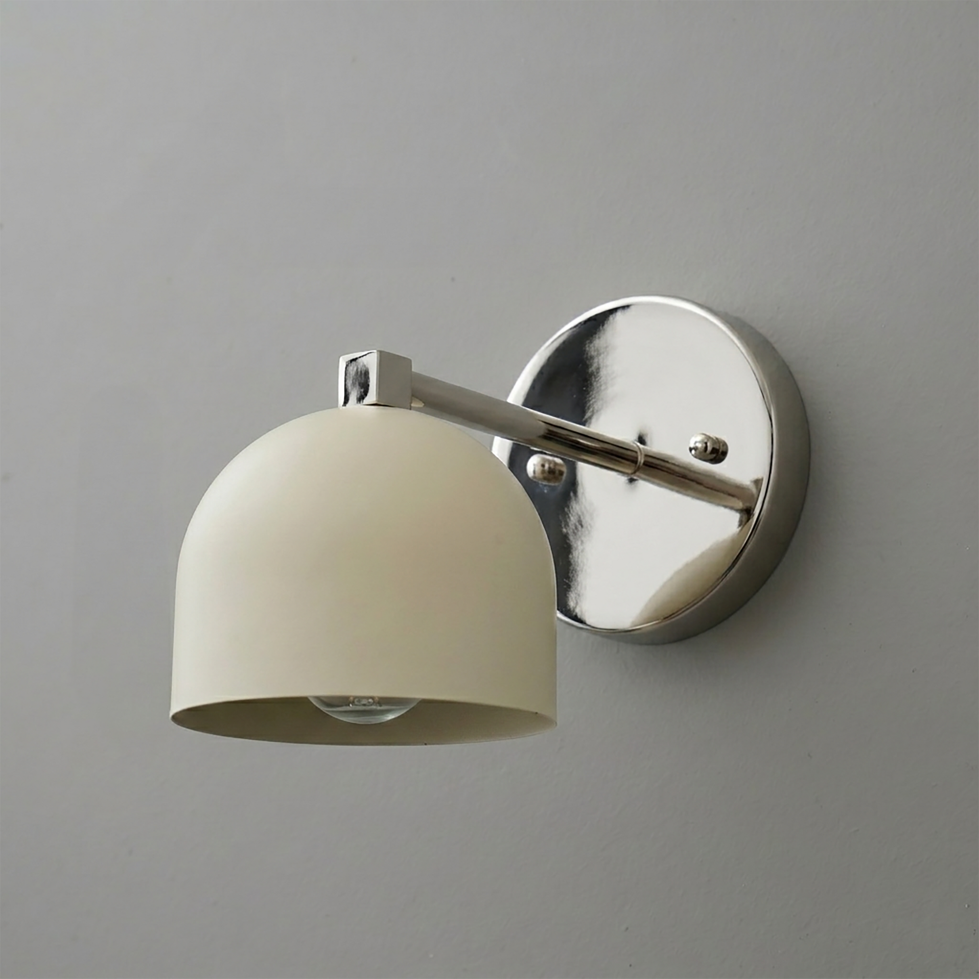 Wall-mounted sconce with matte beige dome shade and polished chrome arm and round base. - SCONCE MODEL NO. 3622