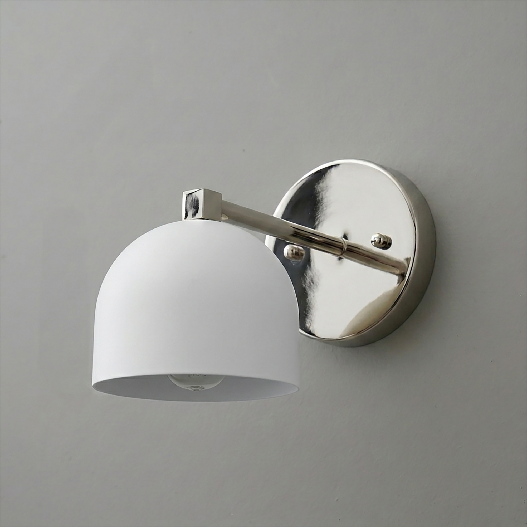 Wall-mounted sconce with a polished chrome round base and a smooth white dome-shaped shade. - SCONCE MODEL NO. 3622