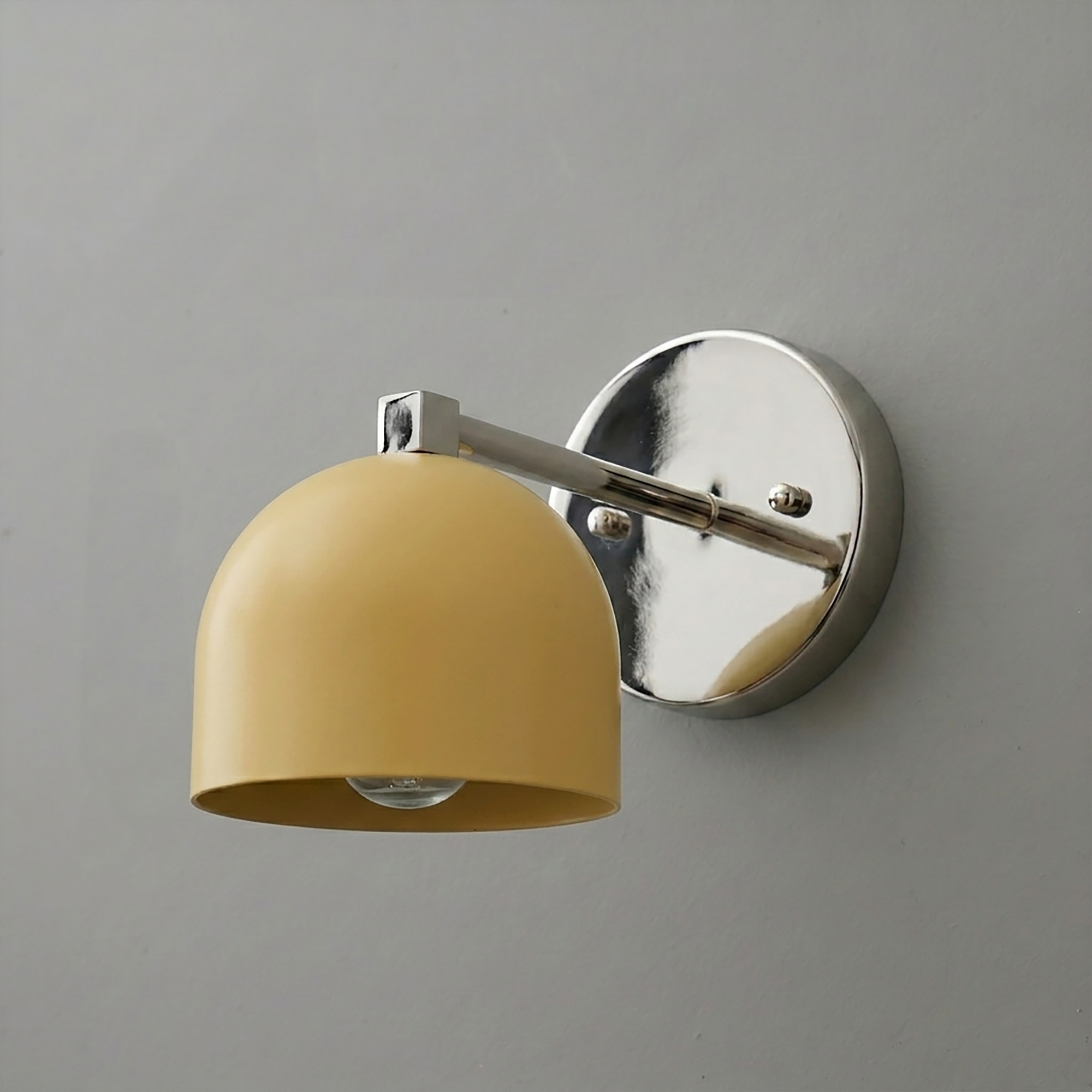 Wall-mounted sconce with a matte yellow dome-shaped metal shade and polished chrome arm and base plate. - SCONCE MODEL NO. 3622